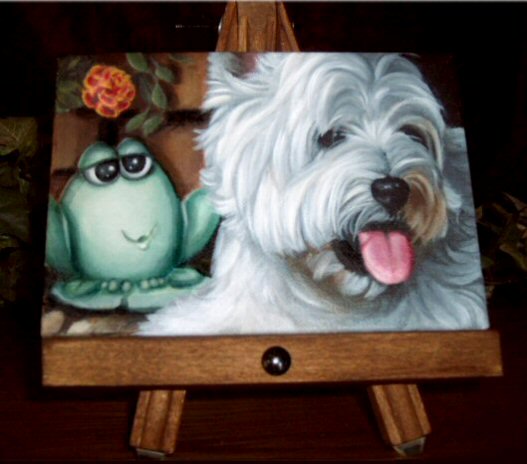 http://www.small-breed-dogs.com/images/Westiew.gardenfrog.jpg